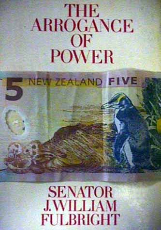 A Penguin looks out under The Arrogance of Power.