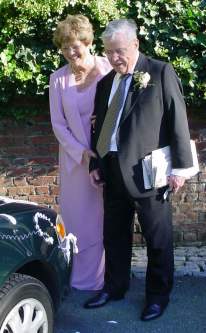 The newlyweds examine what we did to Dad's nice clean car.