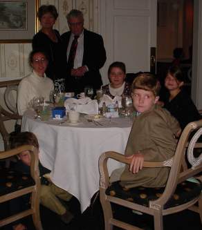 Dad and Evelyn pose with all of the walking Grandkids.