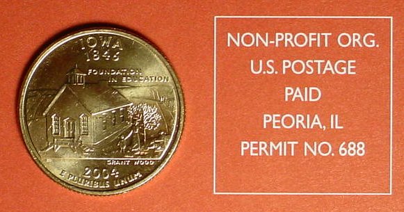 An Iowa quarter sits next to a bulk mail postage mark from Peoria IL.