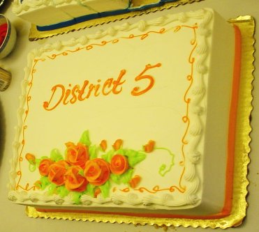 A bright orange District 5 on a yummy looking cake.