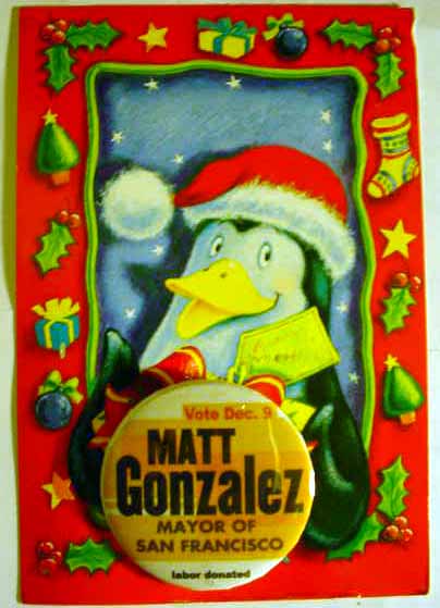 A penguin holds a Matt Gonzalez button.