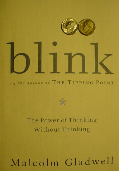 A pair of dimes above the word "blink".