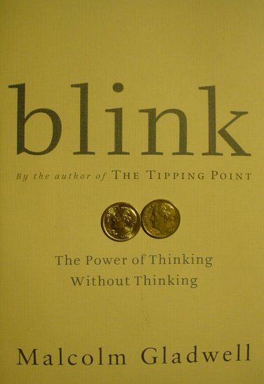 A pair of dimes on the cover of Blink, near the middle of the page.