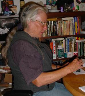 Jody works on the mailing.