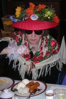 Woman with a great hat and scarf investigates the FBI.