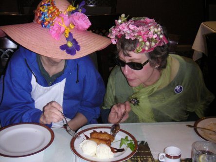 Two pick at the dish of mysterious yet beatiful stuff.