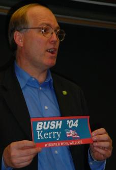 Cobb with a sticker that makes it clear the status quo expects to win no matter which major Party Candidate gets elected.