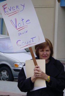 Woman with an Every Vote Should Count sign.