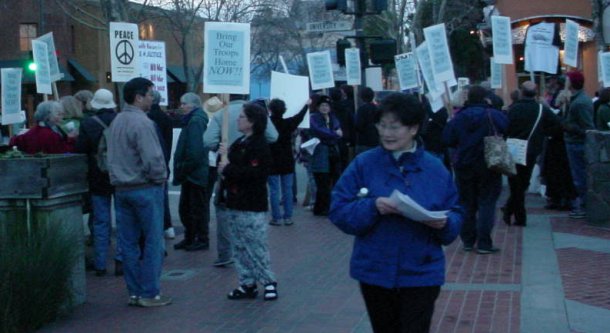 MANY PEOPLE WITH SIGNS.