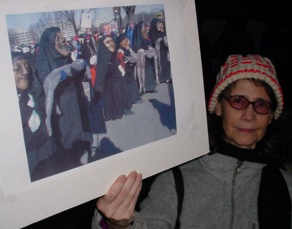 A picture of the mourning mothers with someone who has seen them.