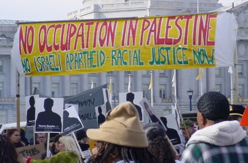 Large banner over a crowd.