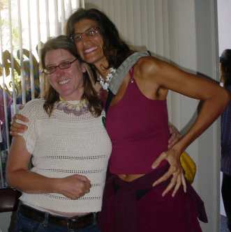 Susan King and Monica pose for the camera with big grins on their faces.