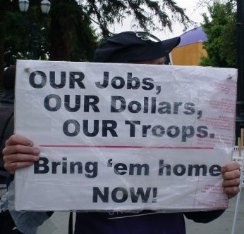 "Our Jobs, Our dollars, our troops, bring them home now.