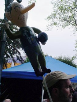 puppet with a stick up its butt.