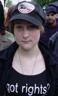 A woman in a shirt that asks "got rights?"