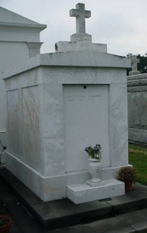 A tomb with SPEAKER on it.