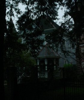 Picture of spooky mansion taken at dusk.