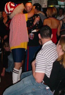 Wildly dressed man tries to make a soldier say "Louisiana."